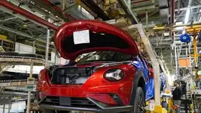 Chaîne de montage automobile en Allemagne illustrant les suppressions d’emplois industriels