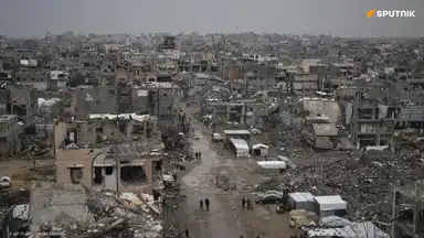 Vue aérienne des ruines à Gaza, symbole de la guerre et du contexte des négociations entre Israël et le Hamas.