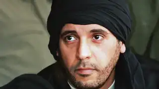 Portrait de Hannibal Kadhafi portant un turban noir