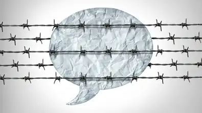 Illustration symbolique d’un discours muselé par des fils barbelés représentant la censure.