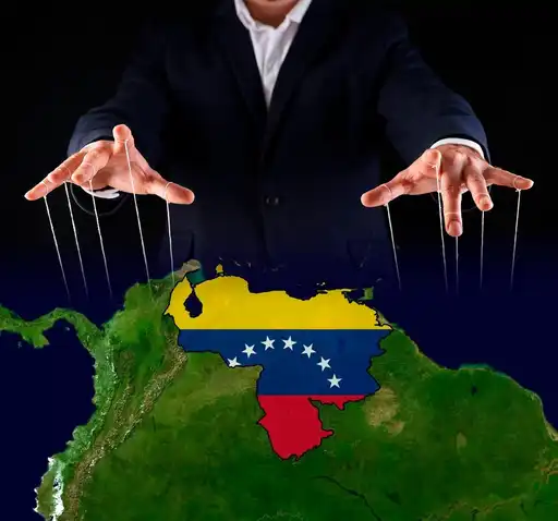 Image du Venezuela manipulé par des fils, illustrant l'influence des États-Unis sur le pays.